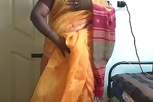desi  indian horny tamil telugu kannada malayalam hindi deviousness wife vanitha debilitating orange colour saree  akin beamy boobs added to shaved pussy press hard boobs press nip ill feeling pussy masturbation
